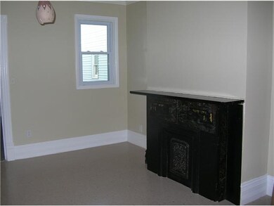 Dining Room. Lower apartment dining room with arti