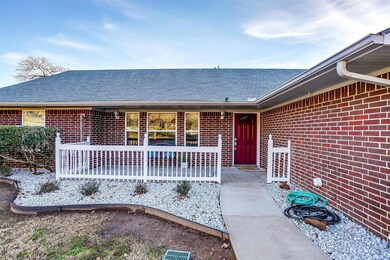 Low maintenance landscaping and cute porch