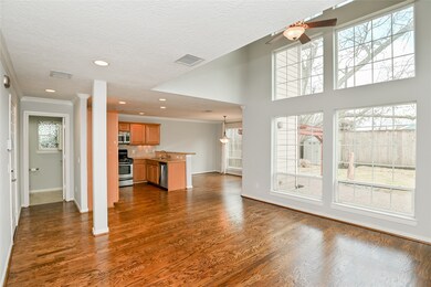 Living area looking towards kitchen and dining are