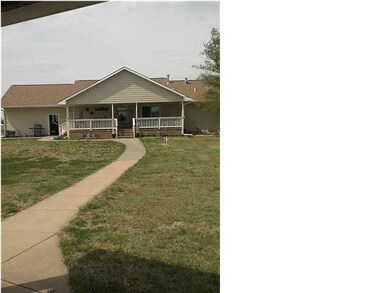 BACK OF HOME. ENJOY THE COVERED DECK WHICH FACES B