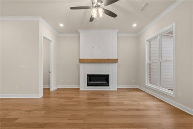 A gas fireplace makes this space extra cozy in the winter! *Please note that photos shown are representative of the floorplan but are not photos of the actual home available.