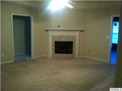 A large great room with gas log fireplace. Great f