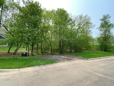 Curb cut is on far left side of lot