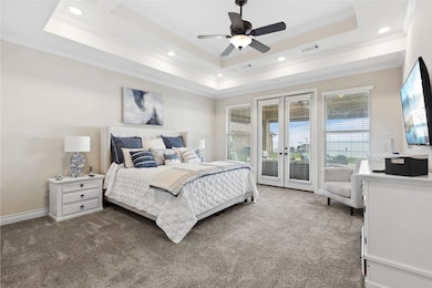 The spacious and inviting primary suite features t