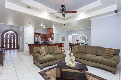 Notice the open floor plan with a wide and welcoming entry.  Double wood and glass doors open to welcome guests.  The office is just off the foyer and the Master is also tucked away from the other bedrooms.  The kitchen has a pantry and lots of seating at the large granite topped bar plus a dining area and full laundry off the garage.  Lots of natural and overhead lighting.  The other 2 bedrooms and shared bath are off on the right of the dining area.  The laundry is just off the garage.