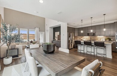 Airy dining area *Photos of furnished model. Not a