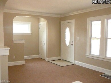 LIVING ROOM-W/NEWER WINDOWS & CARPETING THROUGHOUT