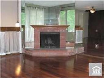 HUGE BRICK WOOD AND GAS BURNING FIREPLACE WITH FUL