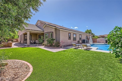 Back of house featuring outdoor lounge area, a pat