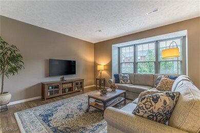 Spacious living room with loads of natural light.