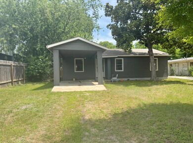 Back of property with a patio area