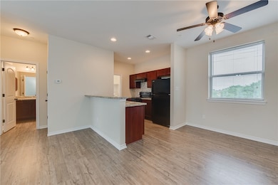 Kitchen featuring visible vents, light wood-style