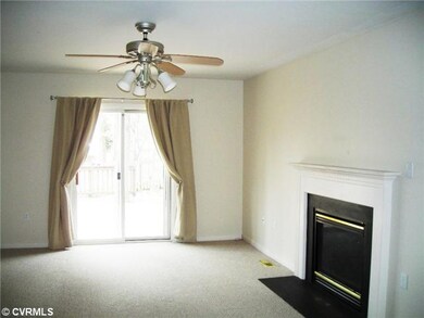 Exterior Front - View of Family Room.  Through sli