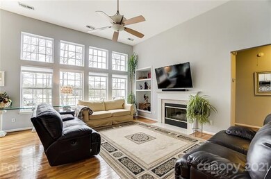 Lots of windows provide tons of natural light & beautiful views of the 7th & 8th fairways.