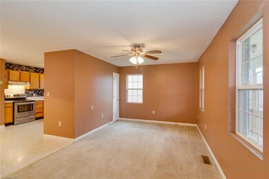 Living Room & Eat-In Kitchen view