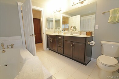 Master Bath with separate shower and soaking tub.