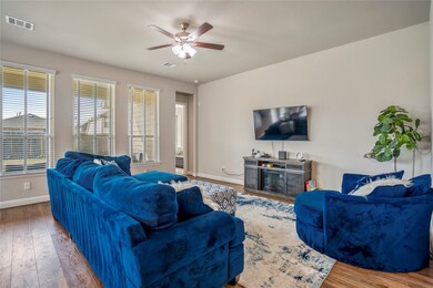 Spacious family room with abundant natural light,