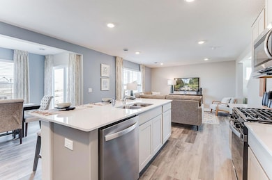 The incredible kitchen will be the heart of your new Princeton with living, dining and gathering spaces all just within reach. (Model photo, colors may vary.)