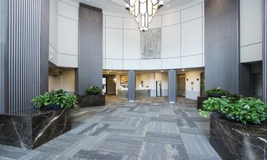 A view of the grand lobby with 24 hour concierge and porter services.