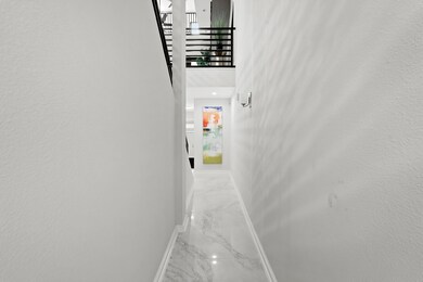Back Entrance Hallway with Marble Floors on Entire