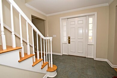Large front entryway welcomes you into the home.