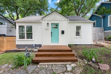 Bungalow featuring board and batten siding and ro