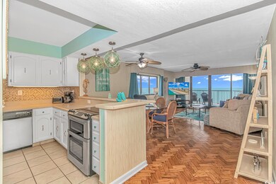 Kitchen featuring white cabinetry, backsplash, kit