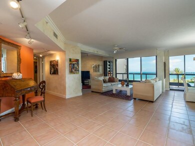 Looking at the living room and den from foyer.