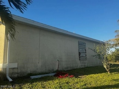 View of home's exterior with a lawn