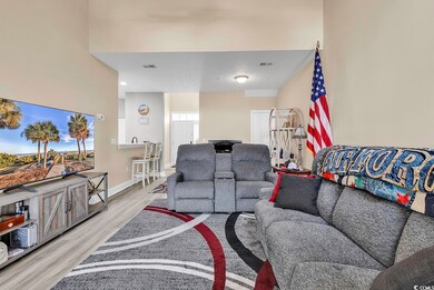 Living room featuring light hardwood / wood-style 