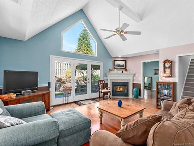 Hardwood floors, gas logs and a view of the waterf