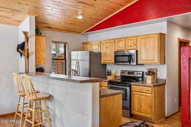 OPEN KITCHEN WITH BREAKFAST BAR