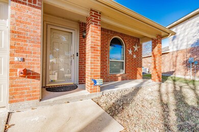 Doorway to property featuring cooling unit and cov