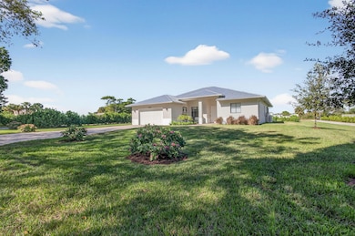 8249 SE Dharlys St, Hobe Sound, FL 33455 - photo 2