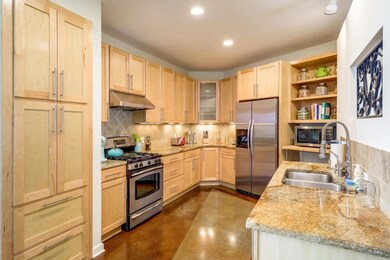 Kitchen featuring appliances with stainless steel