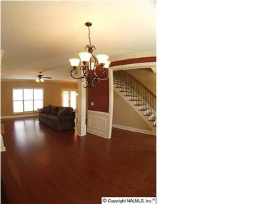 Hardwood floors in dining room and into family room.