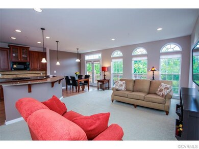 Open family room and kitchen has wonderful flow an