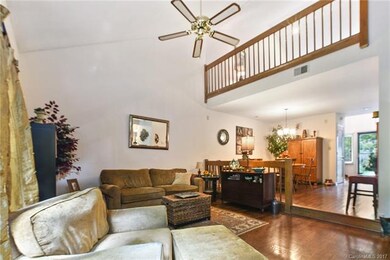 Open concept great room with ample light, convenie