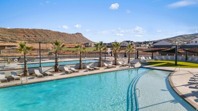 Community pool featuring a mountain view, a patio area, and a residential view