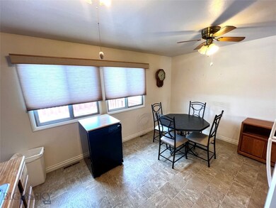 Kitchen area and dining area - large window with v