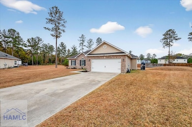 82 Norton St NE, Ludowici, GA 31316 - photo 3