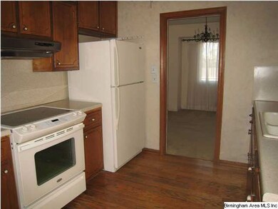 Kitchen with fairly new smooth top stove, refriger