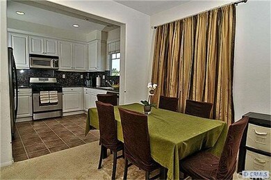 Kitchen opens to dining