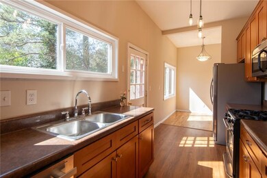 Facing Dining Area and Backyard