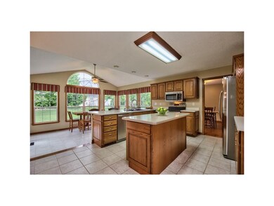 OAK CABINETRY WITH CROWN MOLDING