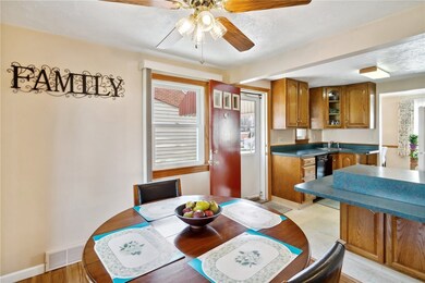 Wonderful eat-in kitchen with a side entry and pen