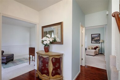 Lovely entry foyer - Note the hardwood floors, 9ft