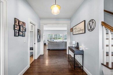 Enter through the spacious foyer. The half bath is to the left, along with access to the laundry room.