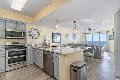 Kitchen with a water view, appliances with stainle