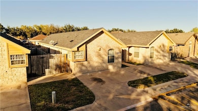 View of front of house featuring a shingled roof